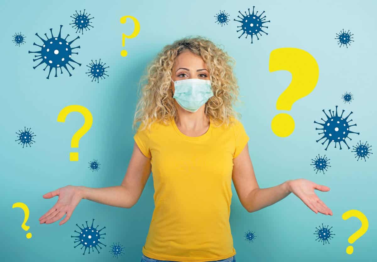 Blonde girl has doubt about covid19 corona virus. Cyan background